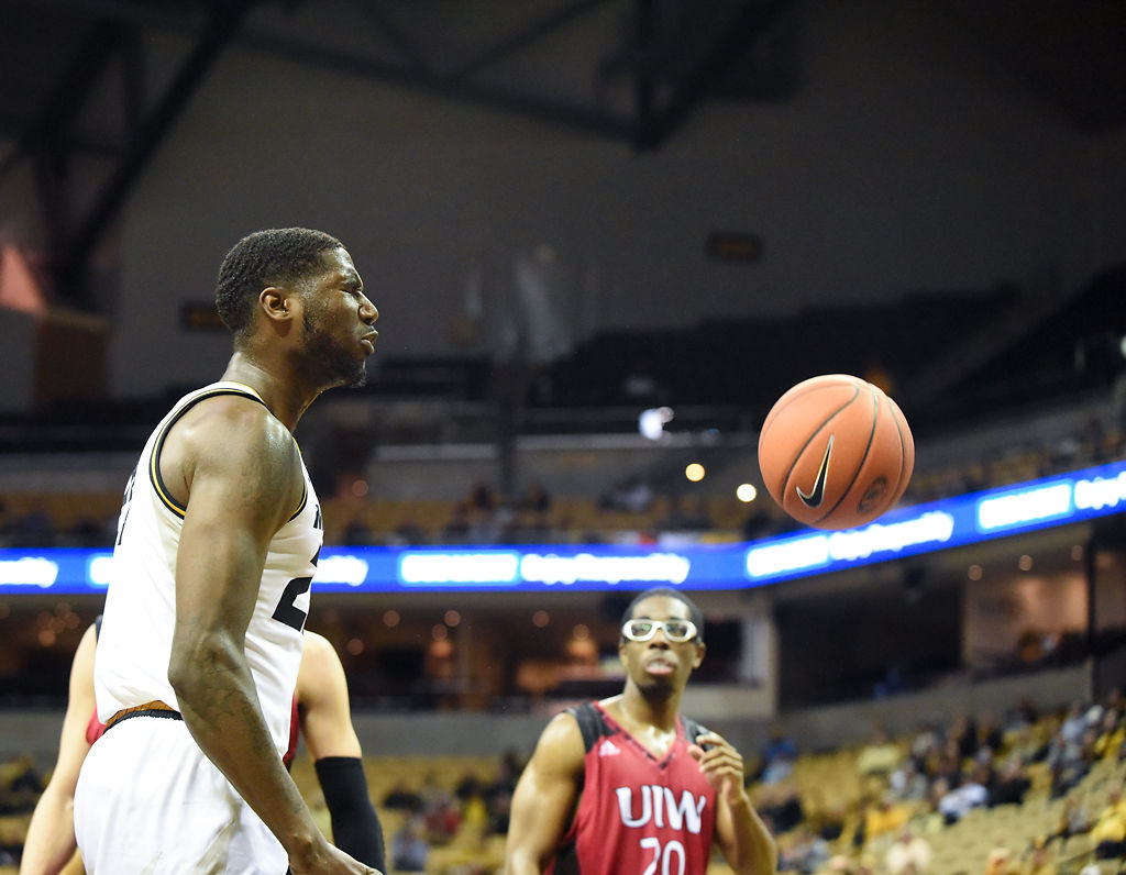 Jeremiah Tilmon reacts after getting fouled after going up for a putback slam dunk